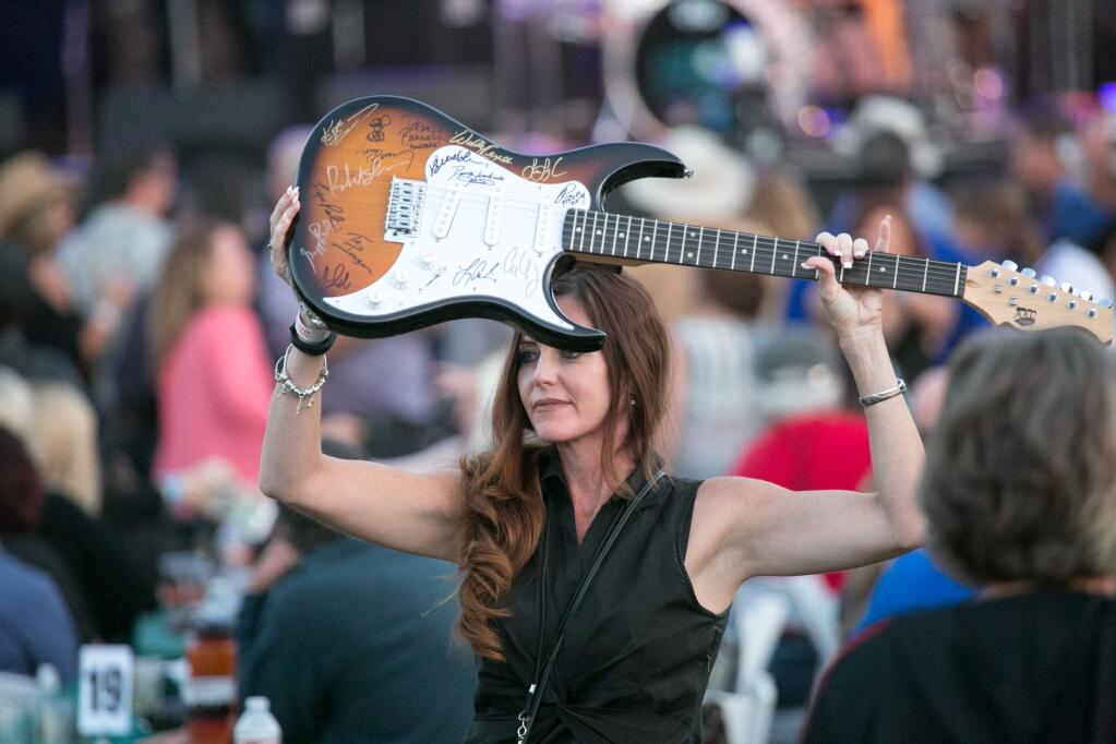 Autographed guitars were auctioned off for charity at the 2015 Sonoma Music Festival. (JULIE VADER/ SPECIAL TO THE SONOMA INDEX-TRIBUNE)