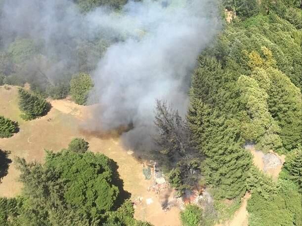 An aerial view of a fully engulfed house fire in the King Ridge Road area. (PHOTO COURTESY HENRY 1)