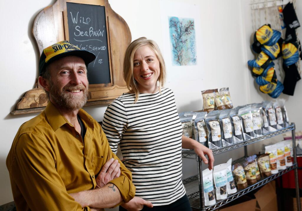 Cole Meeker, left, and Courtney Smith, owners of Sea of Change Trading Company, at their office in Windsor, California on Wednesday, October 21, 2015. Some of the new products the company has produced is a selection of chocolate bars with seaweed as an ingredient. (Alvin Jornada / The Press Democrat)
