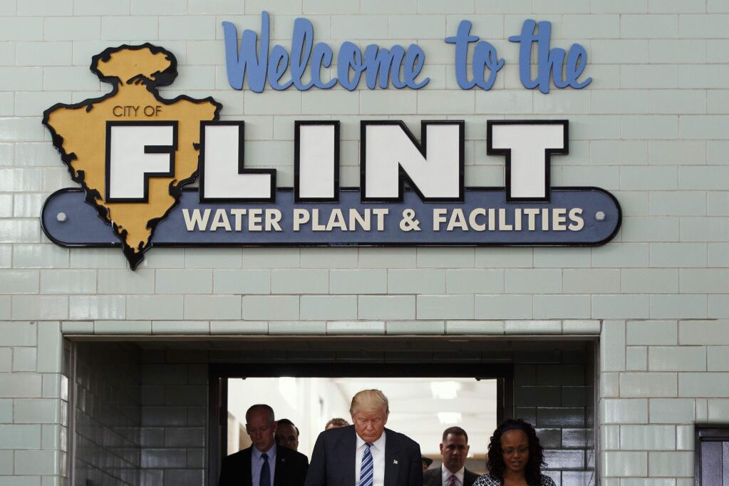 Republican presidential candidate Donald Trump tours the Flint Water Plant and Facilities, Wednesday, Sept. 14, 2016, in Flint, Mich. (AP Photo/Evan Vucci)