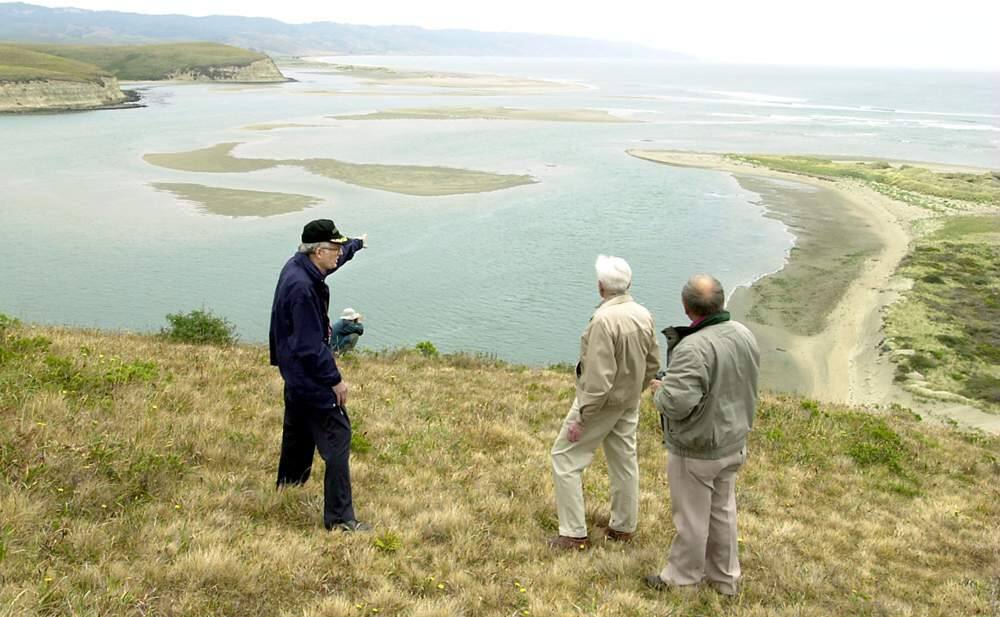 Edward Von der Porten, left, Raymond Aker and Bob Allen of the Drakes Navigator Guild look over Drakes Cove at Point Reyes National Seashore. (CHRISTOPHER CHUNG/ PD FILE, 2001)