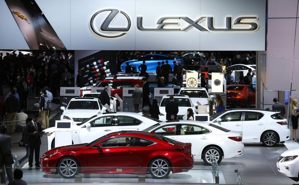 FILE - This Jan. 13, 2014 file photo, shows the Lexus exhibit during media previews at the North American International Auto Show in Detroit. Lexus is the most dependable car brand for the fourth consecutive year in J.D. Powers annual survey, released Wednesday, Feb. 25, 2015. (AP Photo/Paul Sancya, File)