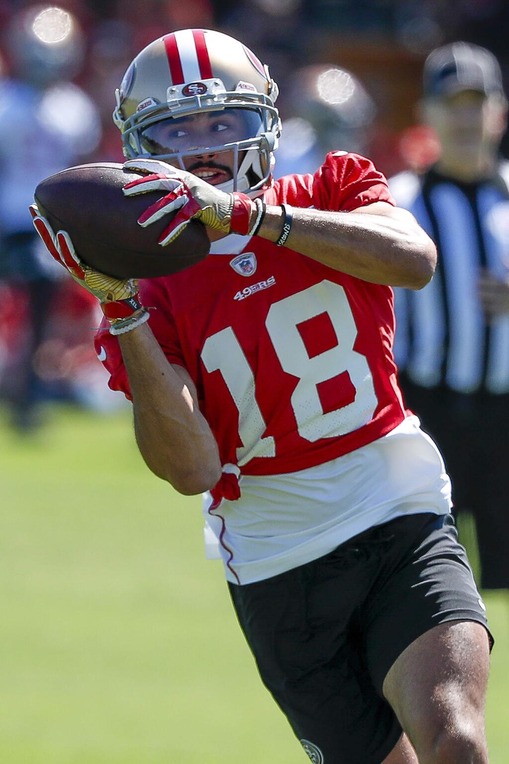 San Francisco 49ers wide receiver Dante Pettis catches a pass during practice at the team's headquarters Friday, July 27, 2018, in Santa Clara. (AP Photo/Tony Avelar)