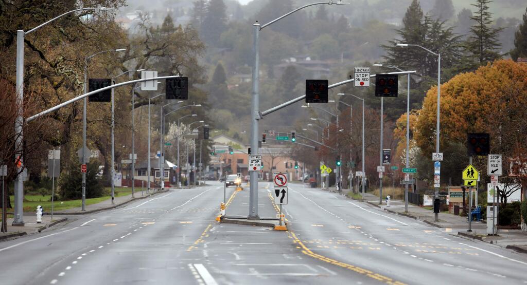Traffic on Mendocino Avenue was unusually light Wednesday, the first day of Sonoma County's shelter-in-place order. (KENT PORTER / The Press Democrat)