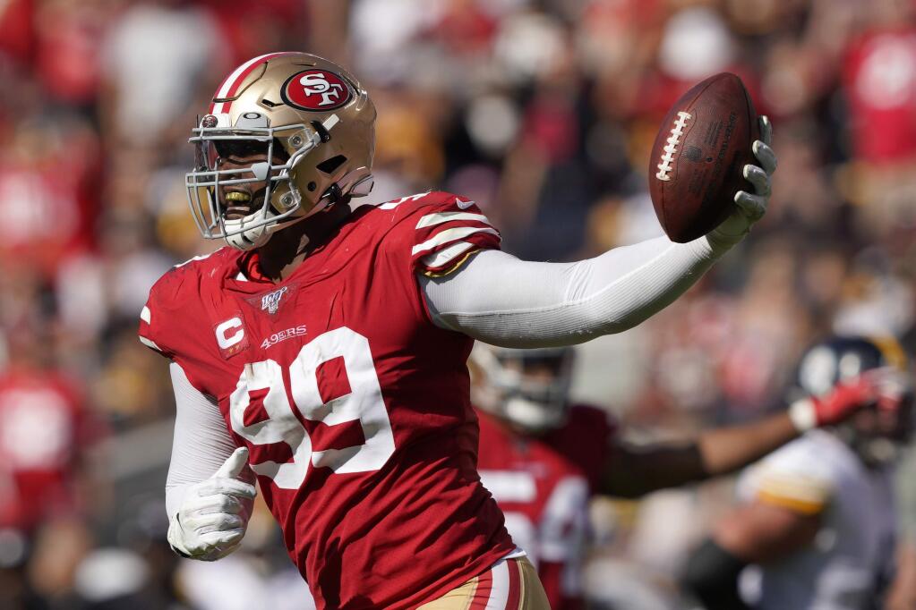 San Francisco 49ers defensive tackle DeForest Buckner celebrates after recovering a fumble against the Pittsburgh Steelers during the second half in Santa Clara, Sunday, Sept. 22, 2019. (AP Photo/Tony Avelar)