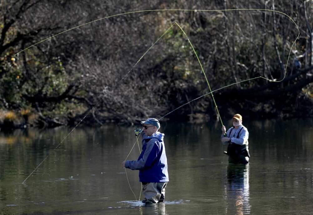 Randy Urry, left, and Bill Laurie fly fish at Steelhead Beach Regional Park in Forestville, California on Wednesday, January 11, 2012. (BETH SCHLANKER/ The Press Democrat)