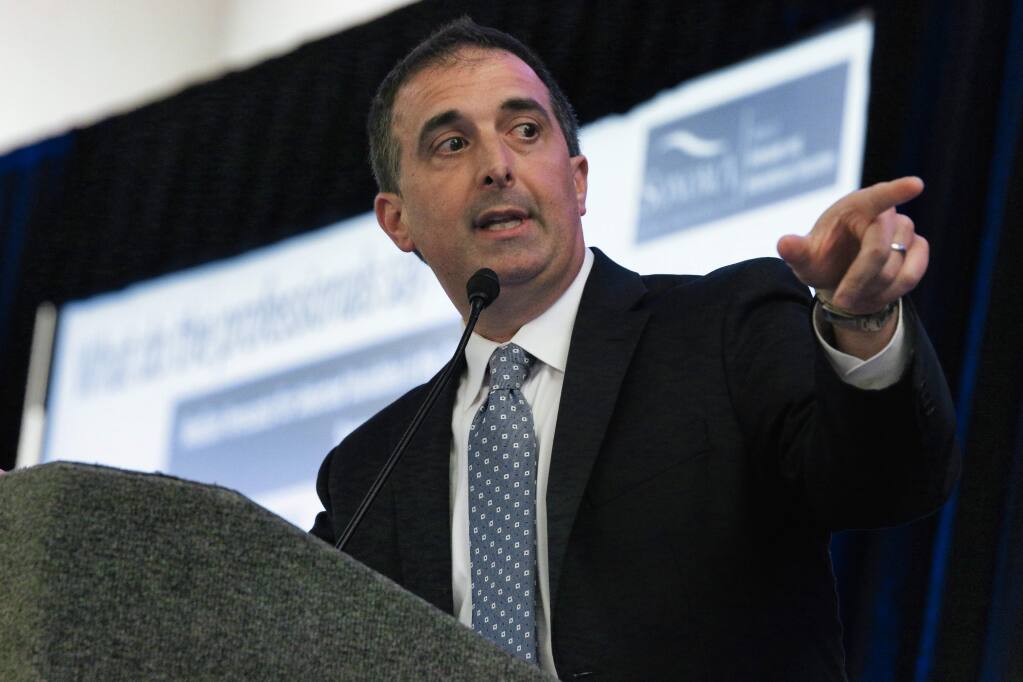 Sonoma State University economist Robert Eyler, Ph.D., reveals indications of what's a head for the business community and homebuilding, speaking at the 27th SSU Economic Outlook Conference, held Thursday, Feb. 20, 2020, in the campus student center in Rohnert Park. (Jeff Quackenbush / North Bay Business Journal)