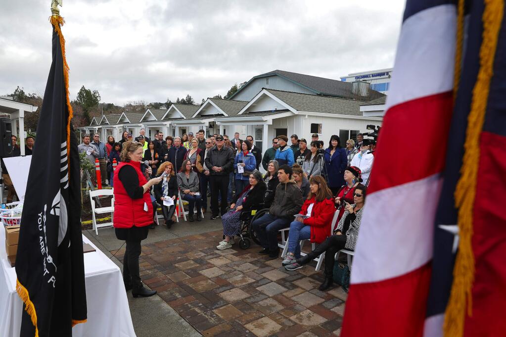 Paula Cook, executive director of Community Housing Sonoma County speaks during the John Zane-Michael Wolff Veterans Village dedication ceremony in Santa Rosa on Friday, Dec. 21, 2018. (CHRISTOPHER CHUNG/ PD)