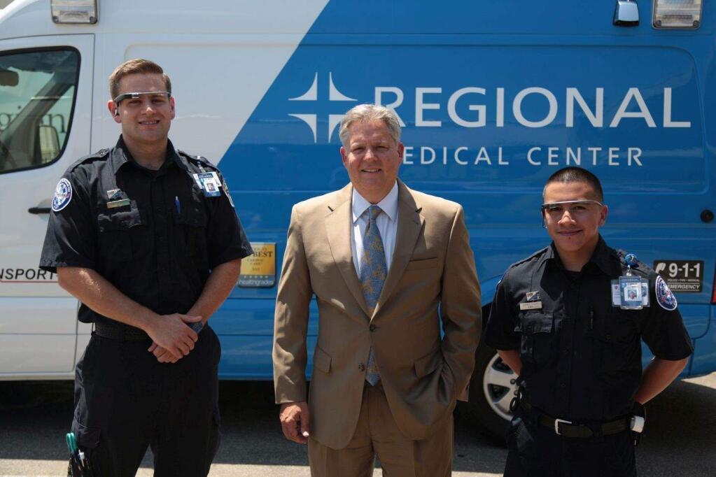 From left, Jeremy Dance, CEO of Regional Medical Center of San Jose, Mike T. Johnson. and Christian Sarcos in front of ProTransport-1's new ambulance outfitted with Google Glass