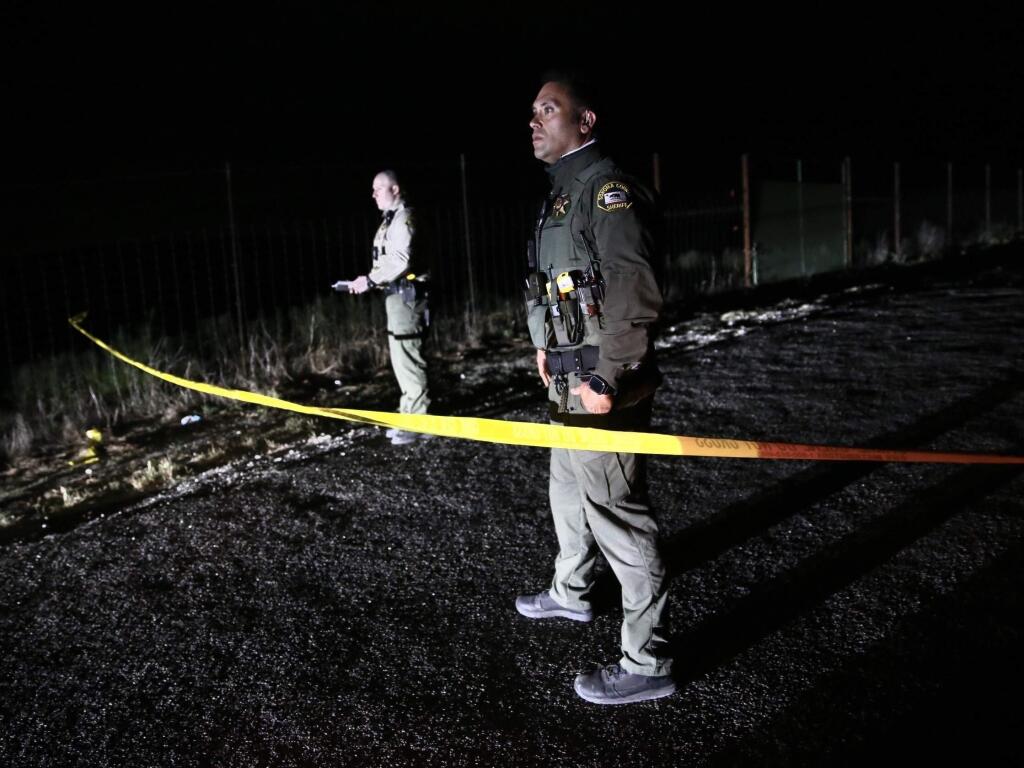 Sonoma County sheriff's deputies close off a section of Browns Lane in Petaluma following a homicide on Thursday, June 11, 2020. (Beth Schlanker/The Press Democrat)