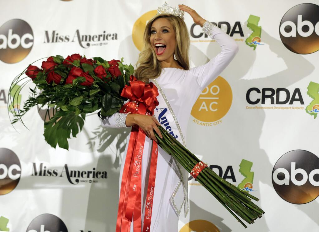 Miss New York Kira Kazantsev poses for photographers during a news conference after she was crowned Miss America 2015 during the Miss America 2015 pageant, Monday, Sept. 15, 2014, in Atlantic City, N.J. (AP Photo/Mel Evans)