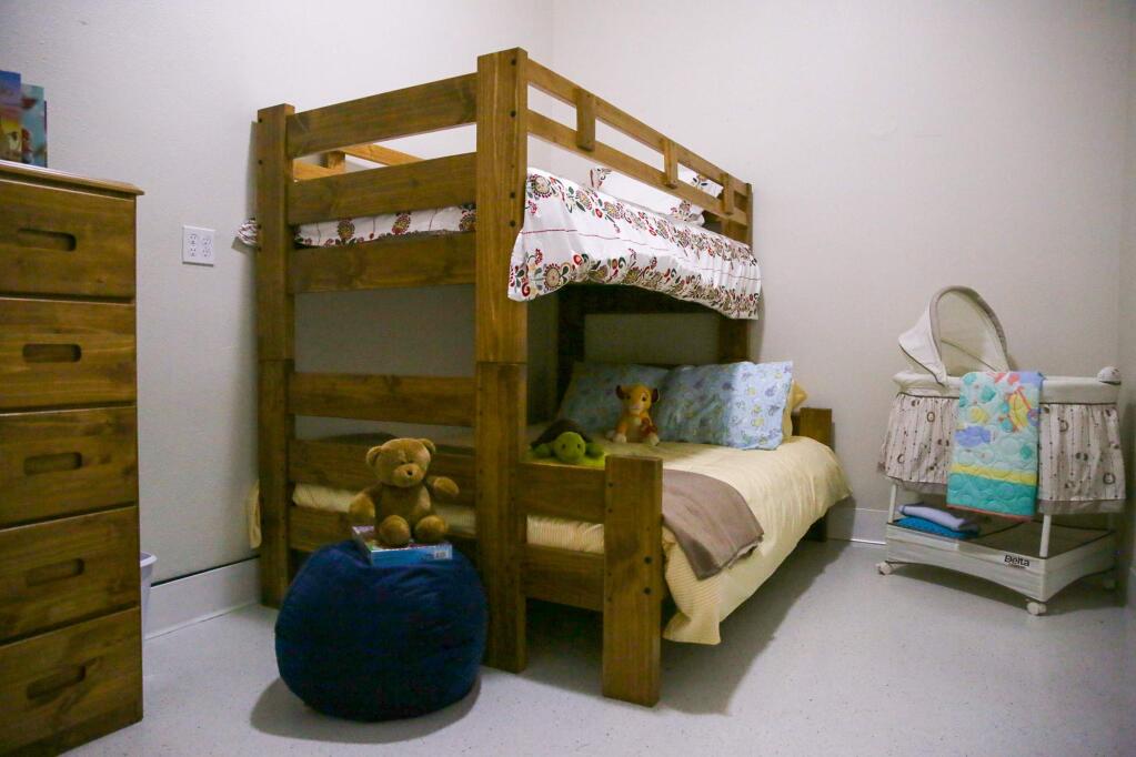 One of the bedrooms ready for a family at the new COTS family center in Petaluma on Saturday, June 27, 2015. (RACHEL SIMPSON/FOR THE ARGUS-COURIER)
