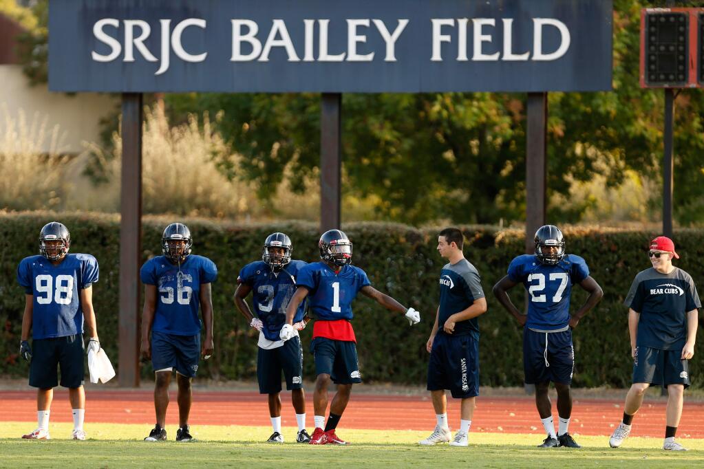 Bear Cubs cornerback Keith Benjamin (1), center, stands at the sideline with other teammates during football practice on Wednesday, Sept. 7, 2016. Keith Benjamin and his brother Keilan are one of two sets of twins playing on the SRJC football team.(Alvin Jornada / The Press Democrat)