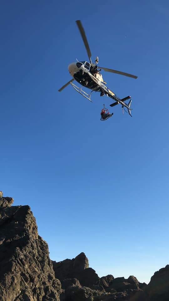 A CHP helicopter rescues a man suffering a medical emergency from Schoolhouse Beach. Photo: Bodega Bay Fire Protection District