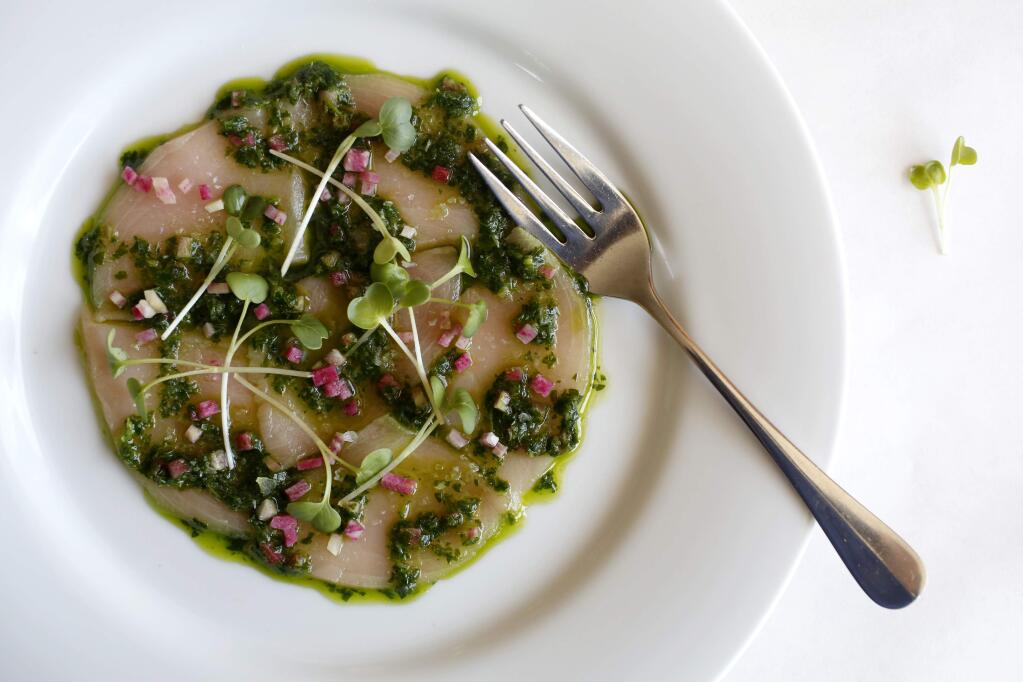PHOTO: 4 by BETH SCHLANKER / The Press Democrat -The Hamachi crudo with a parsley and radish salsa, horseradish, lemon juice, olive oil and sprouted watercress at the Michelin starred Terrapin Creek restaurant in Bodega Bay.