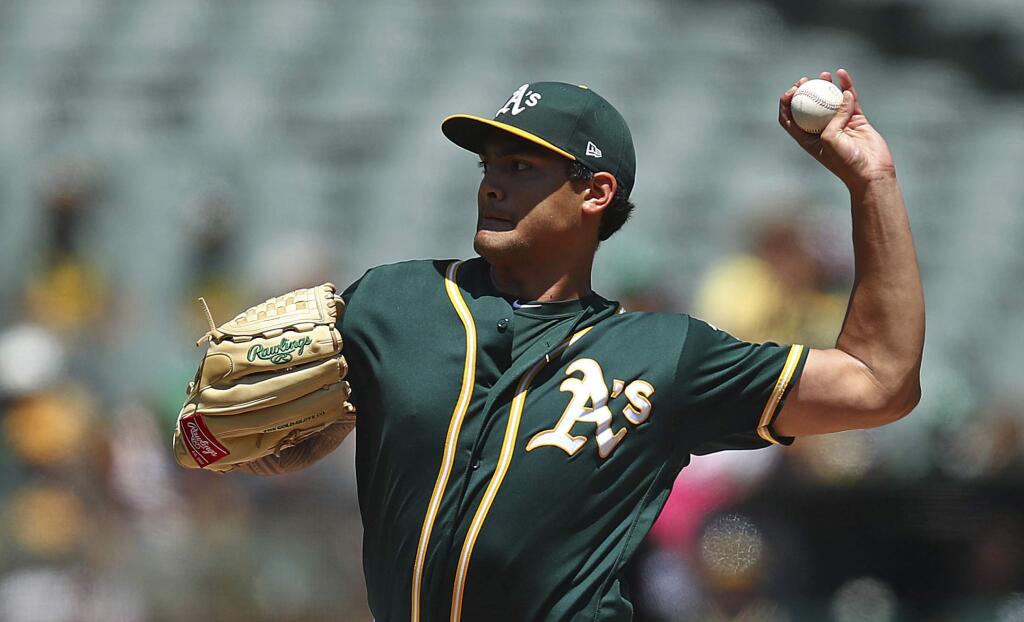 Oakland Athletics pitcher Sean Manaea works against the Toronto Blue Jays in the first inning Wednesday, Aug. 1, 2018, in Oakland. (AP Photo/Ben Margot)