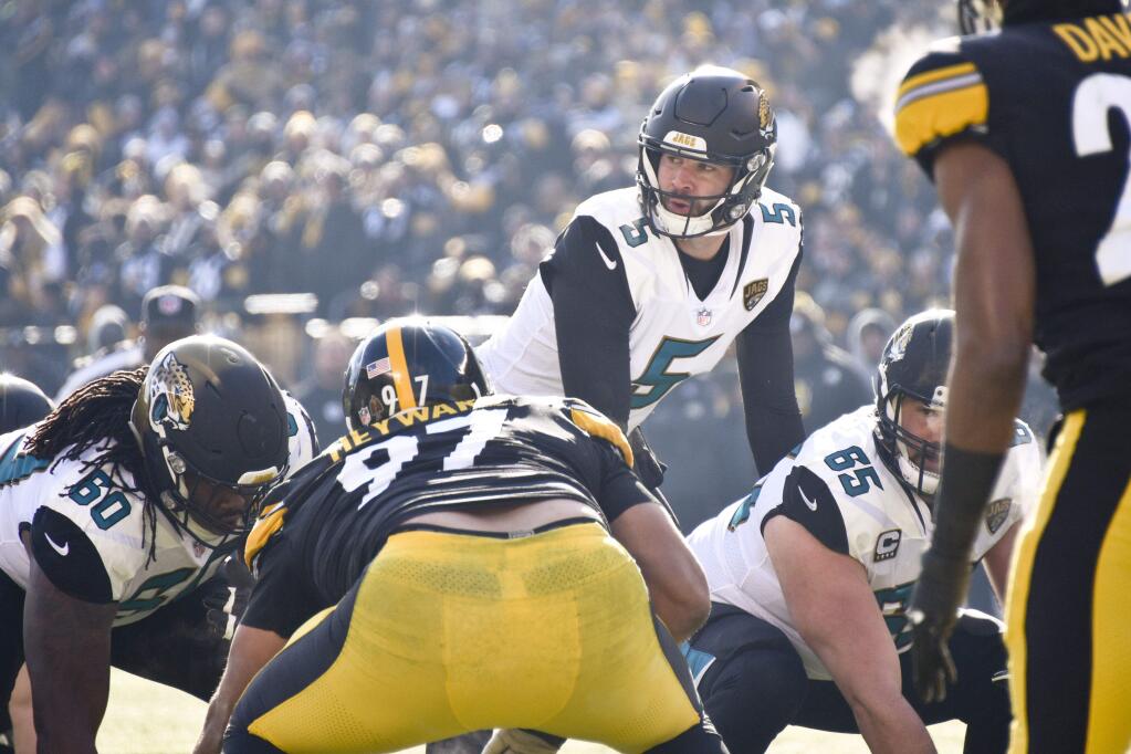 Jacksonville Jaguars quarterback Blake Bortles (5) plays in an NFL football game against the Pittsburgh Steelers, Sunday, Jan. 14, 2018, in Pittsburgh. (AP Photo/Don Wright)