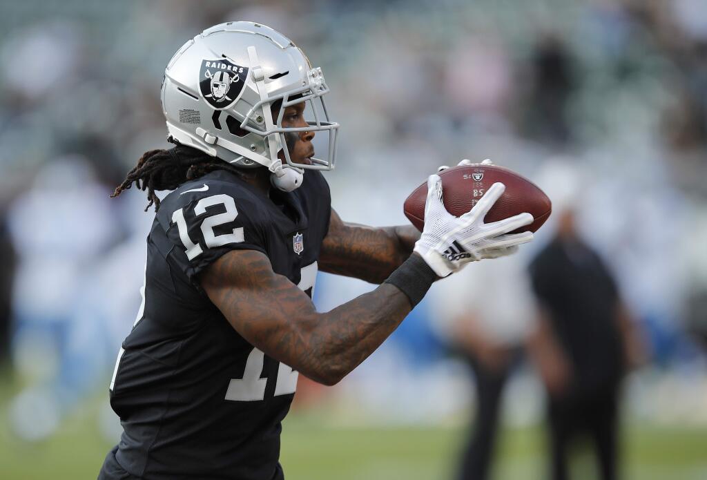 Oakland Raiders wide receiver Martavis Bryant warms up before a preseason game against the Detroit Lions in Oakland, Friday, Aug. 10, 2018. (AP Photo/John Hefti)