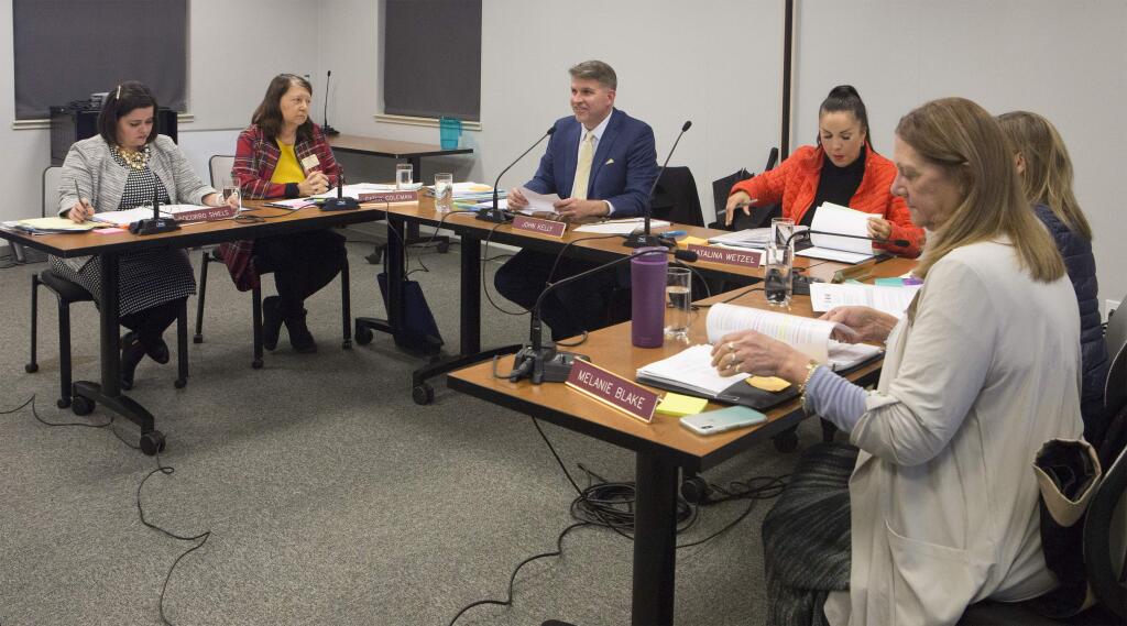 Sonoma Valley school board trustees discuss the voting areas for the next election. From left: Socorro Shiels, district superintendent; trustees Cathy Coleman, John Kelly (board president), Catalina Wetzel, Britta Johnson, and Melanie Blake.