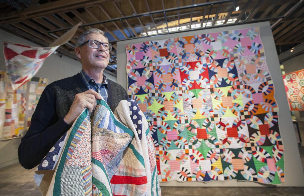 Roderick Kiracofe with some of the quilts from his collection. Starting Saturday, Feb 14, and running through to May 16, the Sonoma Valley Museum of Art presents 'Unconventional and Unexpected: Quilts Below the Radar, 1950-2000', which runs along with 'Shaker Stories from the Collection of Benjamin H. Rose III'. (Photos by Robbi Pengelly/Index-Tribune)