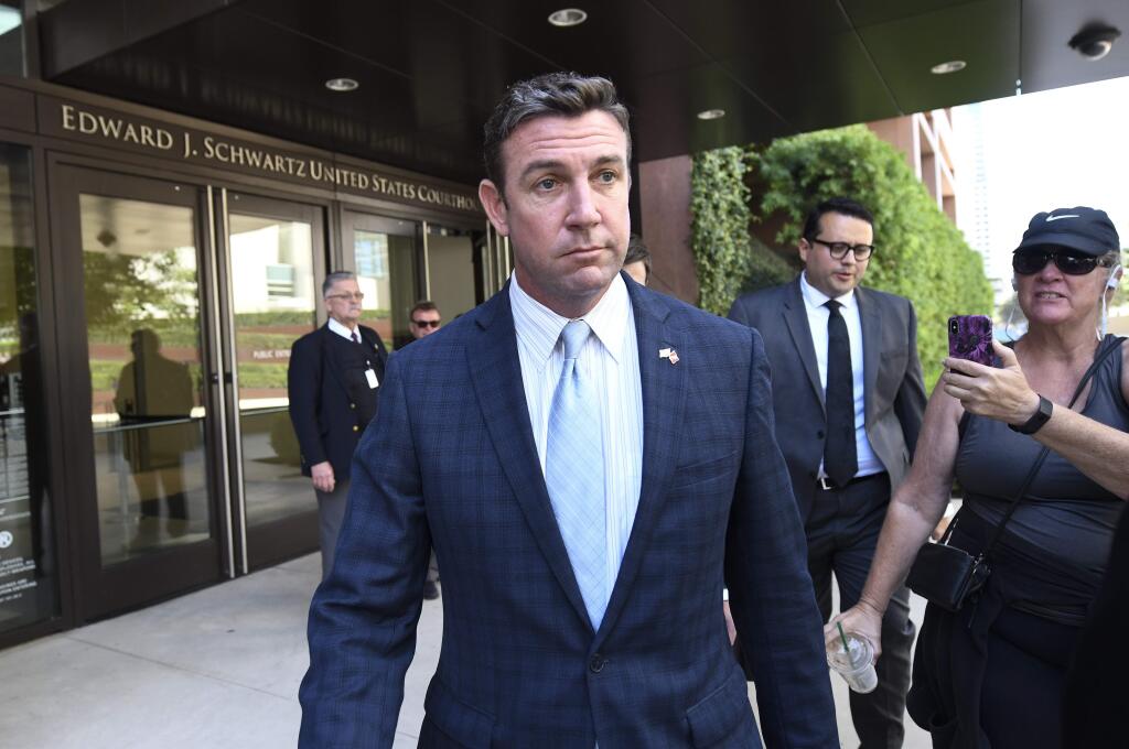 U.S. Rep. Duncan Hunter leaves federal court after a motions hearing Monday, July 1, 2019, in San Diego. U.S. Rep. Hunter of California is charged with looting his own campaign cash to finance vacations, golf and other personal expenses, then trying to cover it up. (AP Photo/Denis Poroy)