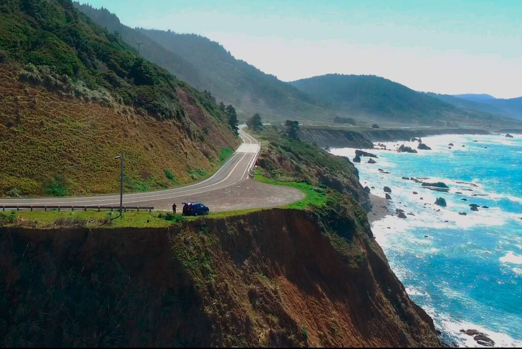 In this Wednesday, March 28, 2018 aerial image from Alameda County Sheriff's Office drone video courtesy of Mendocino County shows the pullout where the SUV of Jennifer and Sarah Hart was recovered off the off Pacific Coast Highway 1, near Westport, Calif. The bodies of the two women and three of their adopted children were recovered after the vehicle plunged over the cliff Monday, while three more of their children, Devonte Hart, 15, Hannah Hart, 16, and Sierra Hart, 12, have not been found. (Alameda County Sheriff's Office via AP)