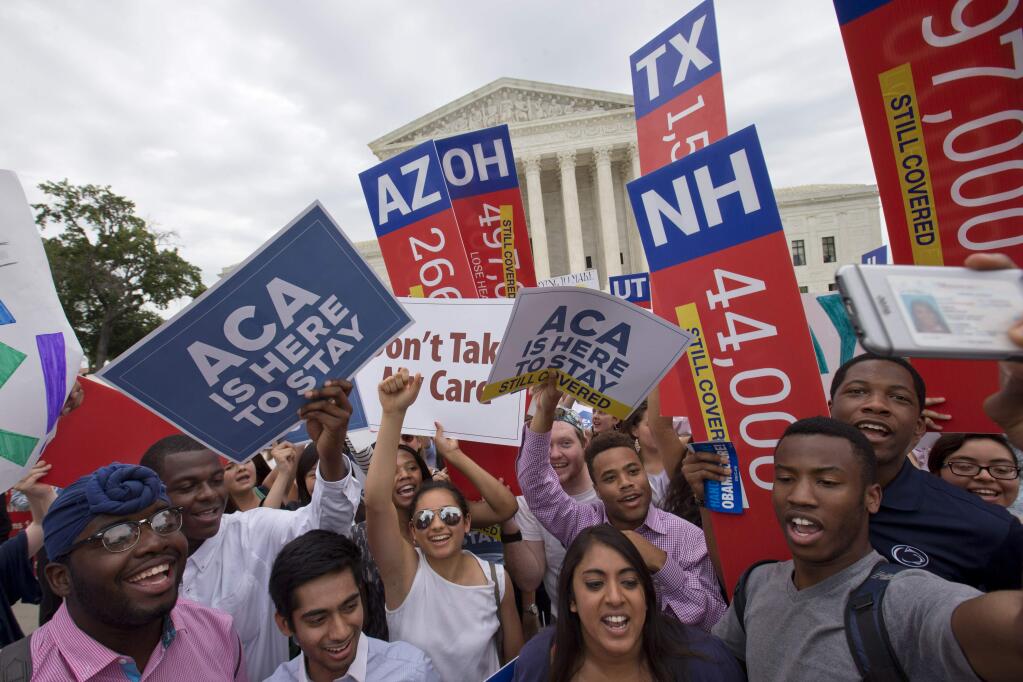 A federal appeals court ruled that the U.S. Supreme Court can keep demonstrators, such as these people celebrating a June ruling on the Affordable Care Act, off its marble plaza without violating their constitutional right to free speech. (JACQUELYN MARTIN / Associated Press)