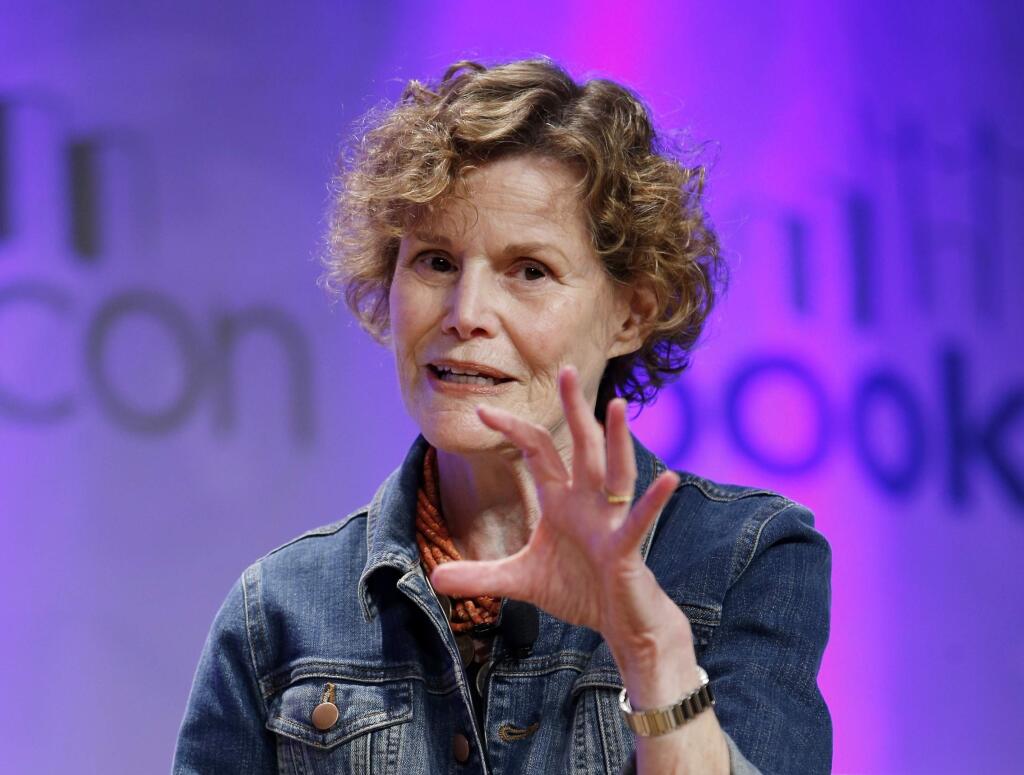 FILE - In this May 31, 2015, photo, author Judy Blume speaks about her new book, 'In the Unlikely Event,' her first novel for adults in 17 years, at BookCon in New York. “Are You There God? It's Me, Margaret” and Hollywood is calling. Judy Blume has at long last agreed to a feature film adaptation of her seminal young adult novel from 1970. (AP Photo/Kathy Willens, File)