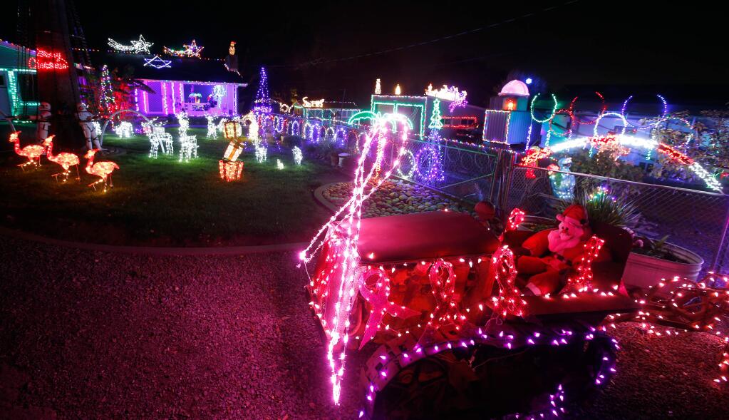 The Christmas light display, which is also synchronized to music, in front of Bob Ottaviano and Golly McGintys home in Sonoma, California, on Wednesday, December 6, 2017. (Alvin Jornada / The Press Democrat)
