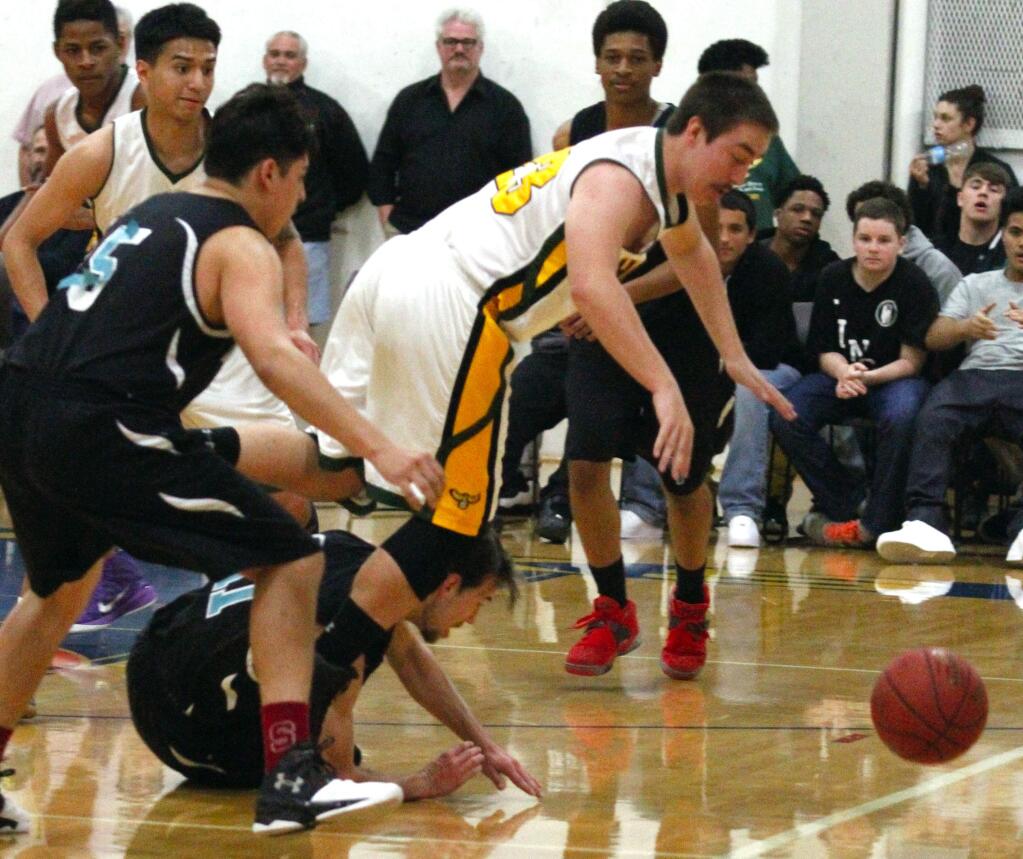 Bill Hoban/Index-TribuneHanna's Mike Veregge goes after a loose ball in Wednesday game against International Christian. Hanna win 81-62 and faces the California School for the Deaf on Saturday.