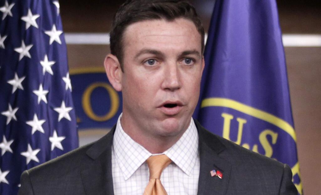 FILE - In this April 7, 2011 file photo, Rep. Duncan Hunter, R-Calif. speaks during a news conference on Capitol Hill in Washington. The Justice Department is investigating Hunter for possible campaign violations. The House Ethics panel has been investigating allegations that Hunter improperly used campaign funds to pay for tens of thousands of dollars in personal expenses, such as trips to Hawaii and Italy and tuition for Hunter's school-age children. (AP Photo/Carolyn Kaster, File)