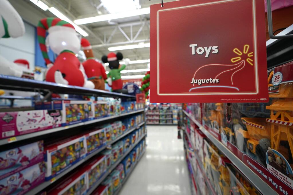 In this Friday, Nov. 9, 2018 photo, toys sit on the shelves at a Walmart Supercenter in Houston. Pediatricians say the best toys for young children are simple, old-fashioned toys like blocks and puzzles rather than costly electronic games or the latest high-tech gadgets. The advice is in a new report on selecting toys for young children in the digital era. It was published Monday, Dec. 3 by the American Academy of Pediatrics. (AP Photo/David J. Phillip, File)