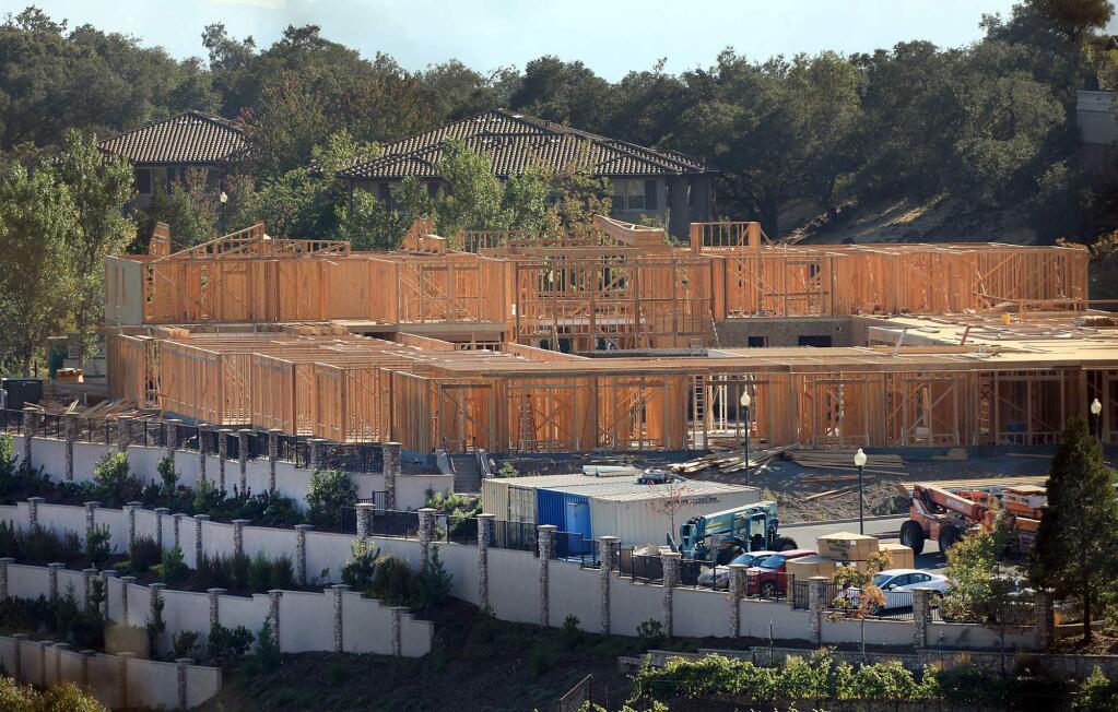 Oakmont of Villa Capri at Varenna is being rebuilt, Thursday, Sept. 6 2018 in Foutaingrove, a year after the Tubbs fire burned the assisted living and memory care facility. (Kent Porter / The Press Democrat) 2018