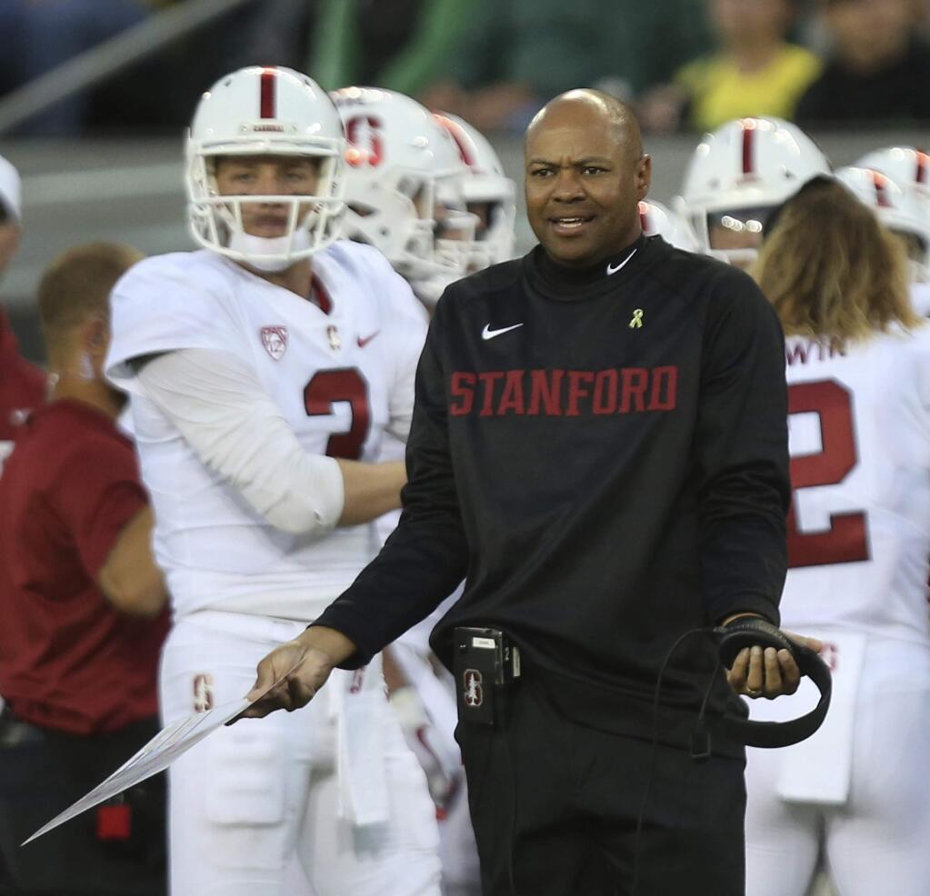 Stanford coach David Shaw gestures toward the referees during the second half of their NCAA college football game against Oregon Saturday, Sept. 22, 2018, in Eugene, Ore. (AP Photo/Chris Pietsch)