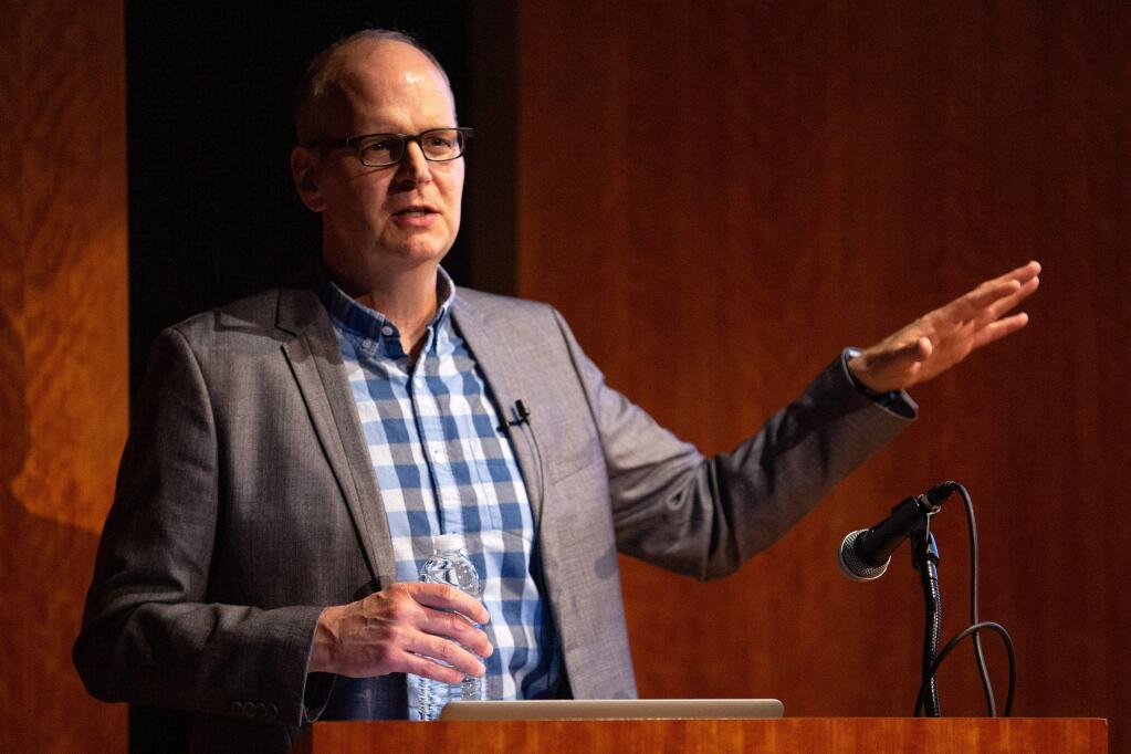 Editorial cartoonist Rob Rogers speaks about his work at the Charles M. Schulz Museum in Santa Rosa, California, on Friday, April 19, 2019. After 25 years as the award-winning editorial cartoonist for the Pittsburgh Post-Gazette, Rogers was fired in June 2018 for drawing unflattering cartoons about President Trump. (Alvin Jornada / The Press Democrat)