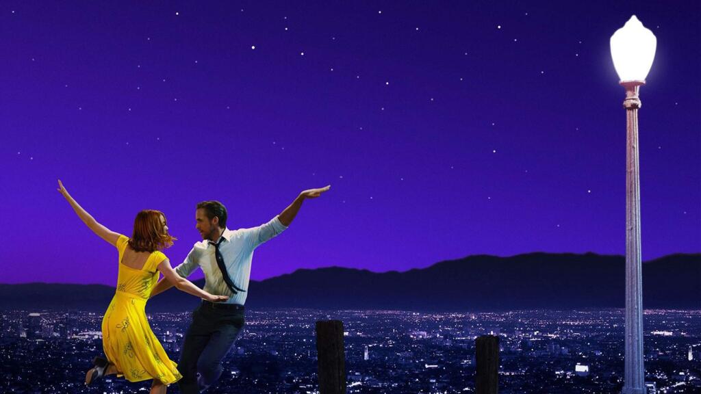 In the musical 'La La Land,' Mia (Emma Stone), an aspiring actress, and Sebastian (Ryan Gosling), a dedicated jazz musician in a story of two people who are struggling to make ends meet in a city known for crushing hopes and breaking hearts. The film explores the joy and pain of pursuing your dreams. (Liongate Films)