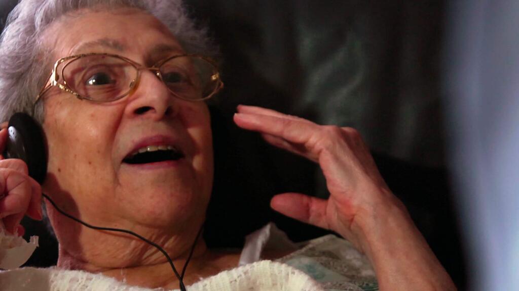 In the documentary 'Alive Inside,' music unlocks worlds of those with dementia. Social worker Dan Cohen's shows a remarkable finding: Listening to music that has some personal resonance can liberate and locate people lost in the fog of Alzheimer's and dementia.