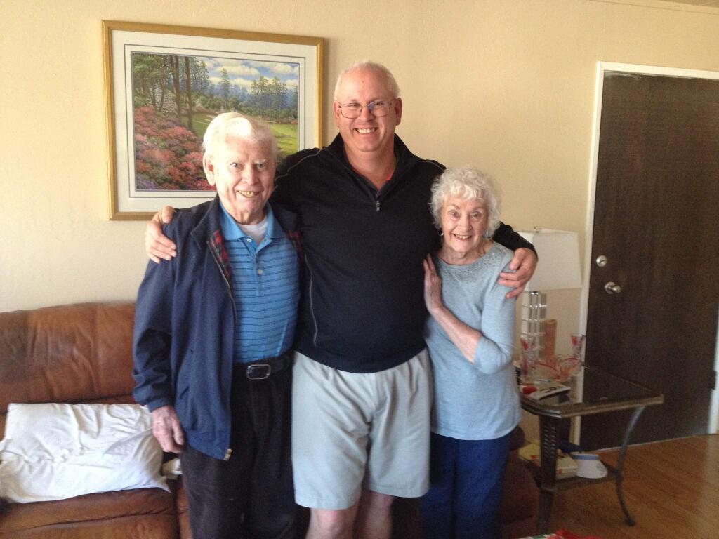 John Groth Sr., left, is seen with his son, John Groth Jr., and his wife, La Belle Groth. (Family photo)