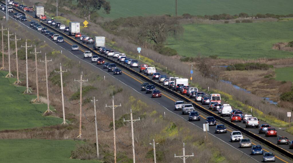 Commute traffic backs up along east- and westbound Highway 37 on April 2. (KENT PORTER / The Press Democrat, 2018)