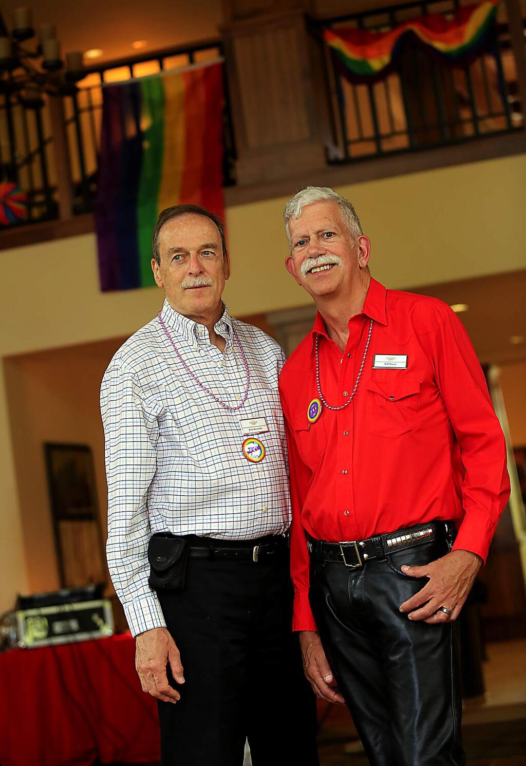 John Kennedy, left, and his husband Bill Baird have been together for 36 years. They celebrated at a Pride party at the Fountaingrove Lodge in Santa Rosa on Saturday night. (JOHN BURGESS / The Press Democrat)