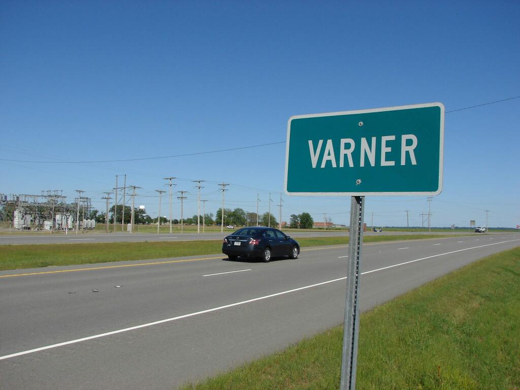 A motorist passes through the tiny community of Varner, Ark., on Thursday, April 27, 2017. The state scheduled the execution of Kenneth Williams at the Cummins Unit prison at Varney for Thursday night. It would be the state's fourth execution in an eight-day period. (AP Photo/Kelly P. Kissel)