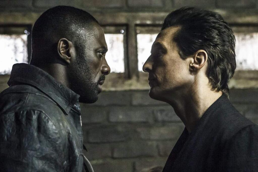 This image released by Sony Pictures shows Idris Elba, left, and Matthew McConaughey in the Columbia Pictures film, The Dark Tower.' (Ilze Kitshoff/Columbia Pictures/Sony via AP)