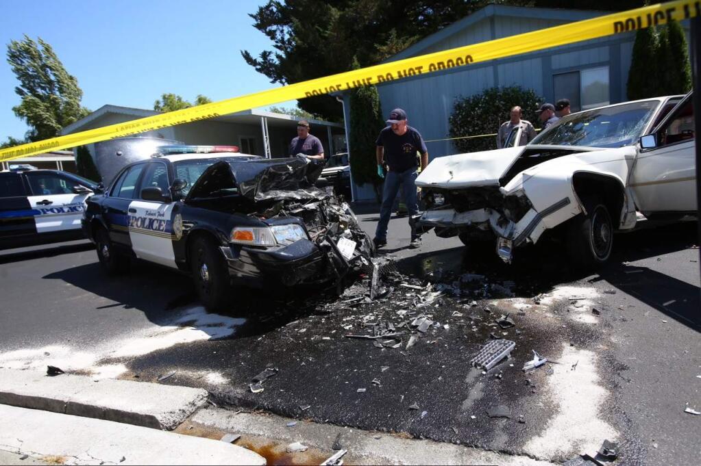 A Rohnert Park public safety officer was hurt when his car was involved in a head-on crash Friday, July 3, 2015, at the Rancho Feliz mobile home park in Rohnert Park. (Photo by Christopher Chung / The Press Democrat)