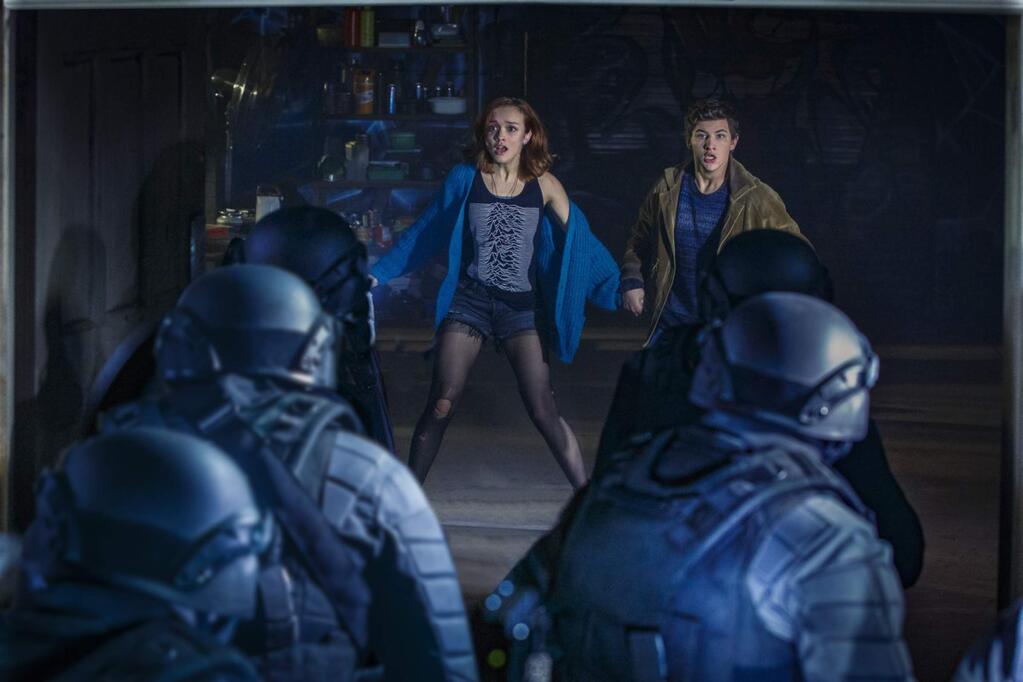 Warner Bros.'Ready Player One' stars Tye Sheridan as Wade and Olivia Cooke as Samantha in Steven Spielberg's adaptation of Ernest Cline's book about peopleliving in virtual reality to escape a society that has collapsed due to catastrophic climate change.