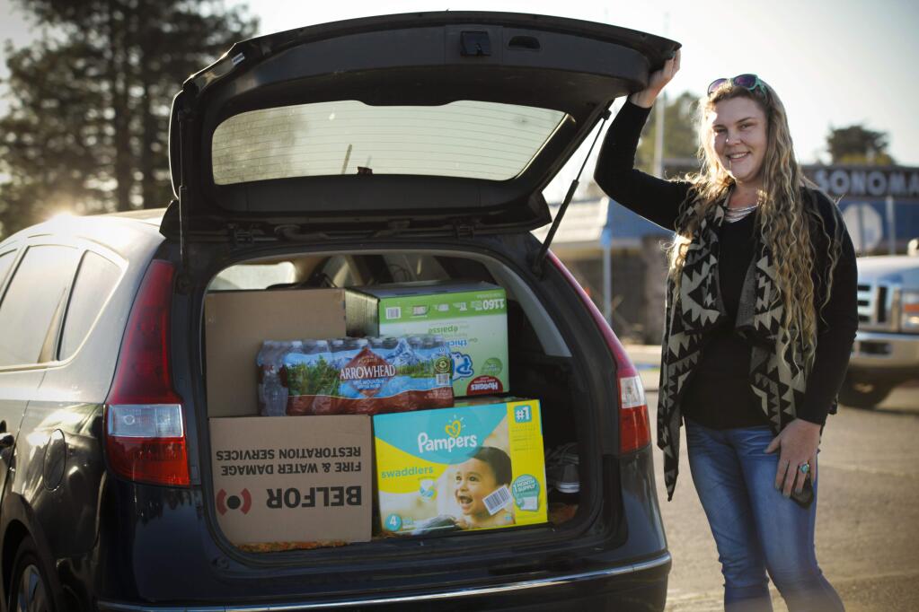 Julie Workman helps victims of the Tubbs Fire by collecting and distributing donations via her non-profit, North Bay Donate. (CRISSY PASCUAL/ARGUS-COURIER STAFF)