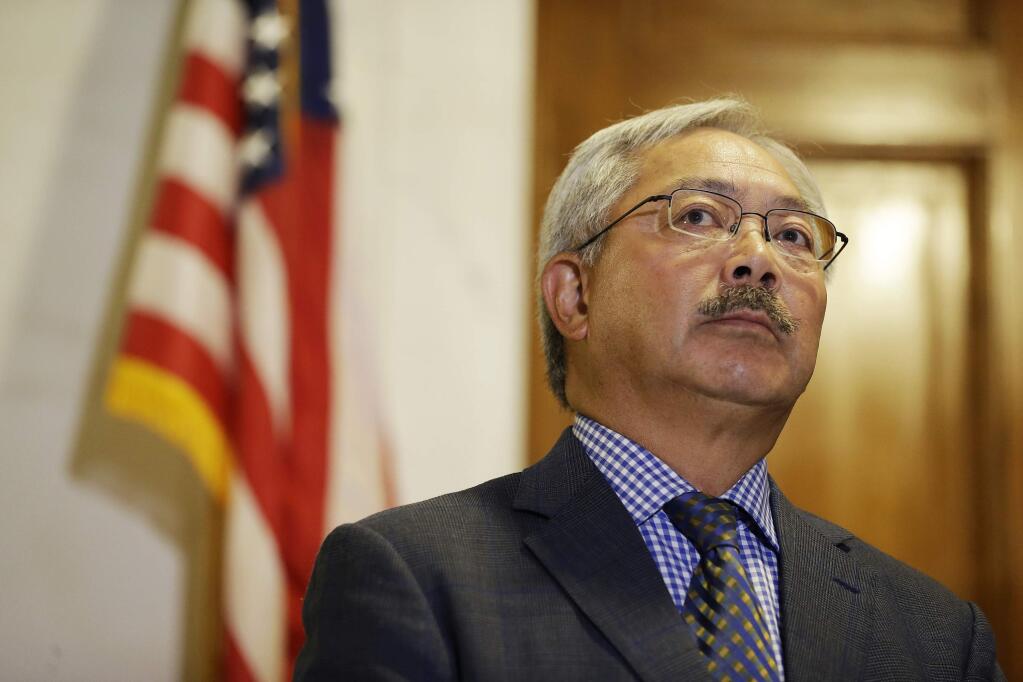FILE - In this Aug. 15, 2017, file photo, San Francisco Mayor Ed Lee listens to questions during a news conference at City Hall in San Francisco. The San Francisco Chronicle reported that Lee died early Tuesday, Dec. 12, 2017. He was 65. (AP Photo/Eric Risberg, File)