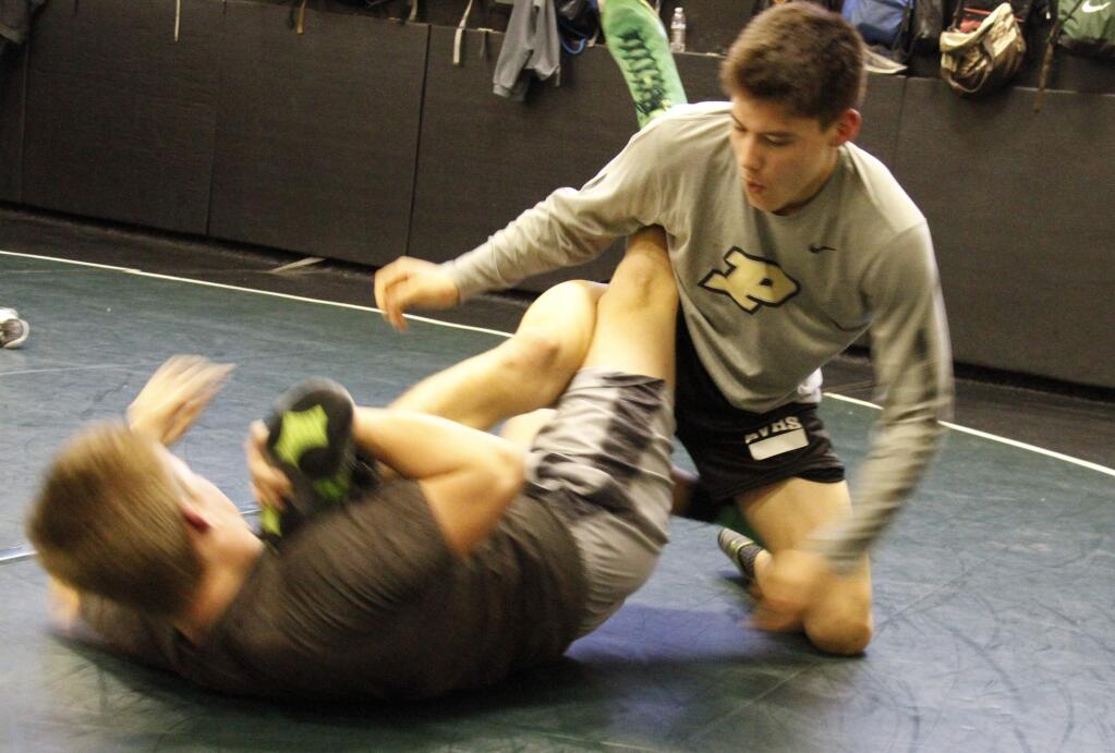 Bill Hoban/Index-TribuneNoah Bartolome, right, and Tyler Winslow during a recent practice. Bartolome and Winslow are two of five returning Sonoma Valley High wrestlers who qualified for the North Coast Section meet last year.