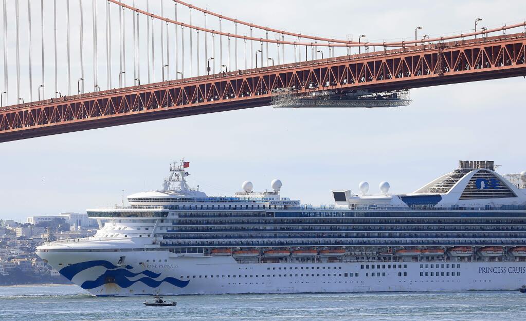 The Grand Princess travels under the Golden Gate Bridge, en route to the Port of Oakland, Monday, March 9, 2020. (Kent Porter / The Press Democrat) 2020