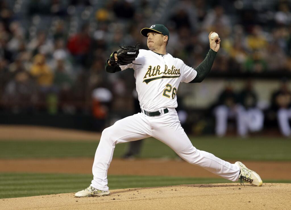 Oakland Athletics pitcher Scott Kazmir works against the Houston Astros during the first inning of a game Friday, April 24, 2015, in Oakland. (AP Photo/Ben Margot)