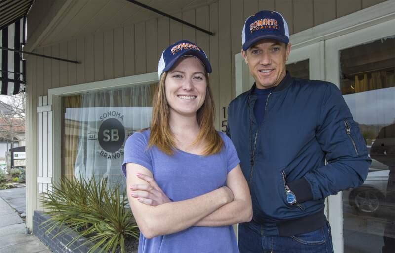 Kelsey Minigan and Jon Sebastiani wearing Stompers gear in front of the Sonoma Brands offices in Sonoma. Photo by Robbi Pengelly/Index Tribune.